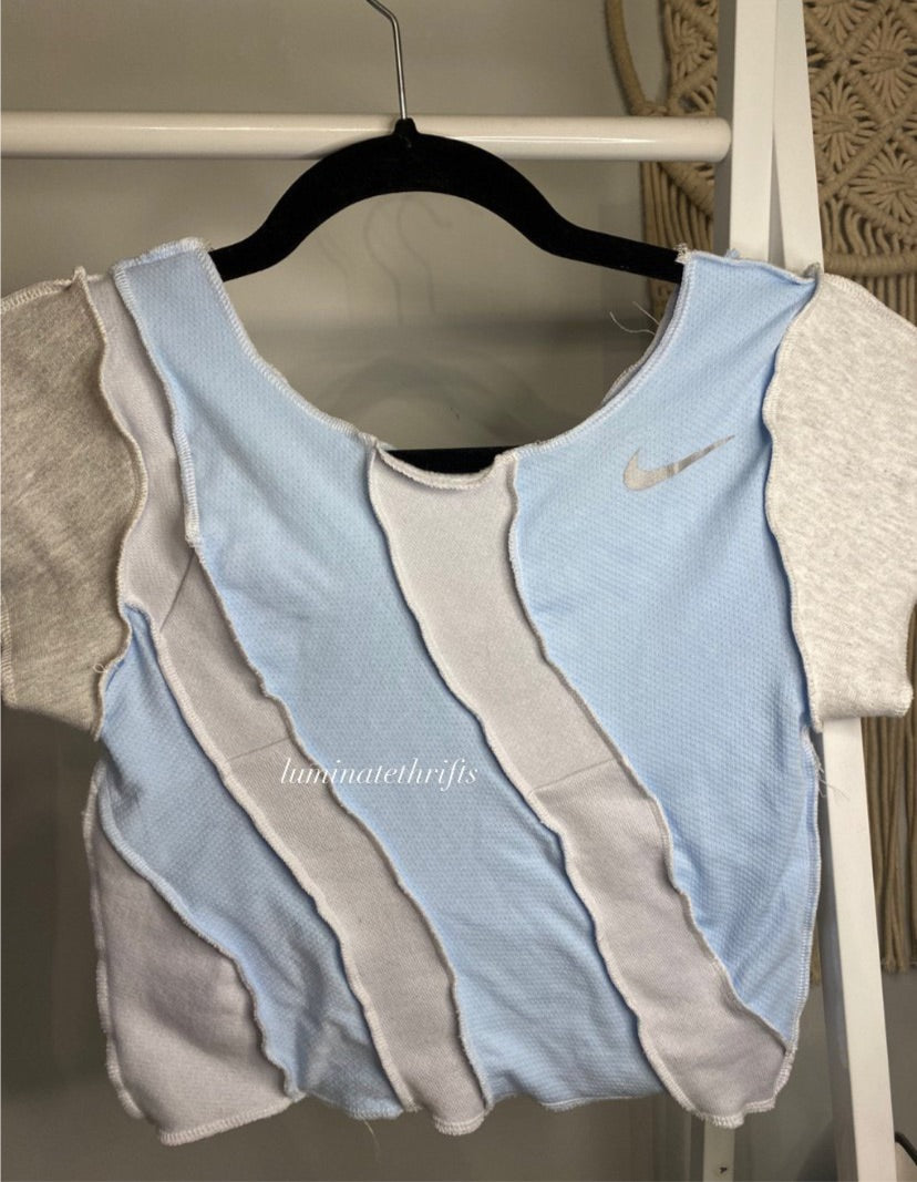 (XS) Light Ocean Waves Reworked Open Hem Top